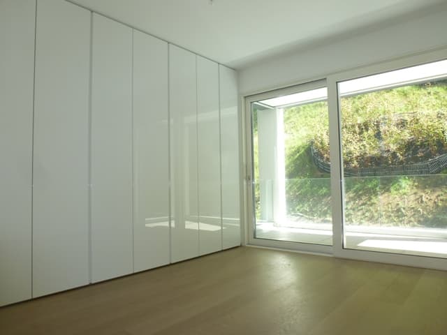 STYLISH 3.5 ROOMS WITH VIEW OF LUGANO GULF.