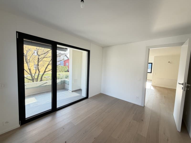 APPARTAMENTO 4.5 LOCALI CON GIARDINO AD USO ESCLUSIVO IN ELEGANTE PALAZZINA