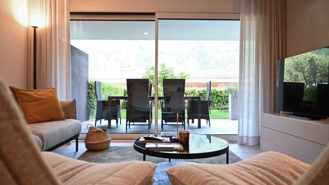 NUOVO APPARTAMENTO 3.5 LOCALI CON TERRAZZA E GIARDINO