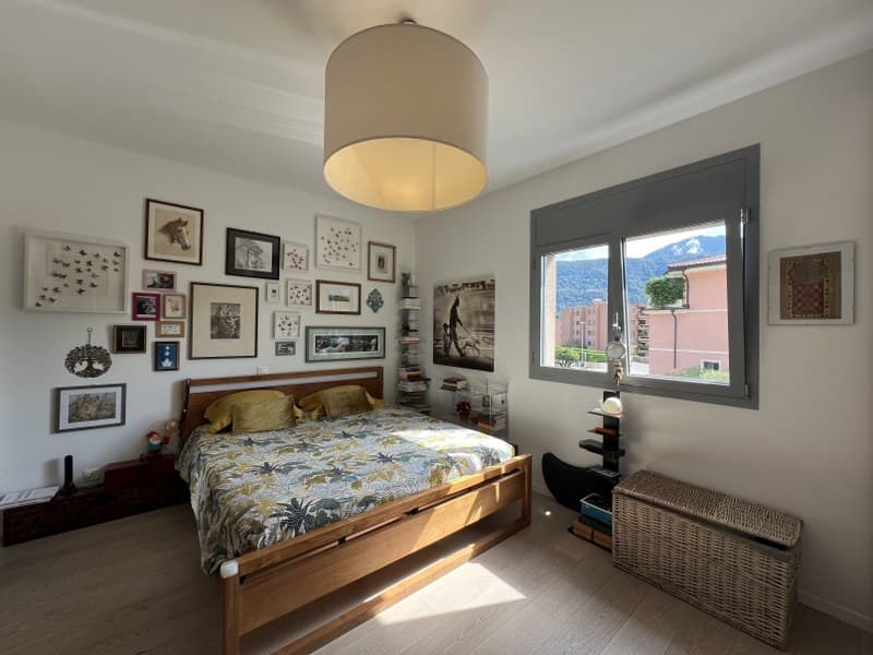 ESCLUSIVO ATTICO DI 4.5 LOCALI CON SPLENDIDA VISTA LAGO