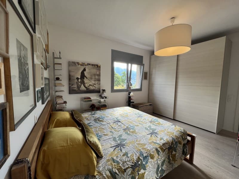 ESCLUSIVO ATTICO DI 4.5 LOCALI CON SPLENDIDA VISTA LAGO