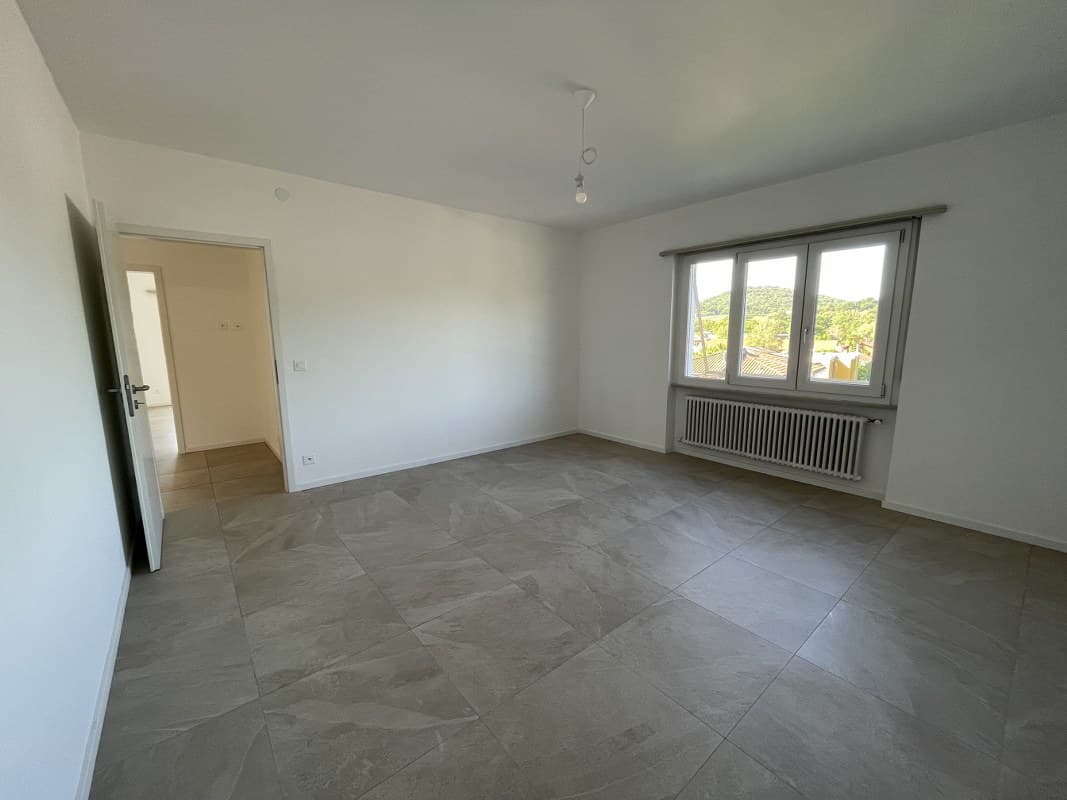 SPAZIOSO APPARTAMENTO DI 4.5 LOCALI CON TERRAZZA E VISTA APERTA