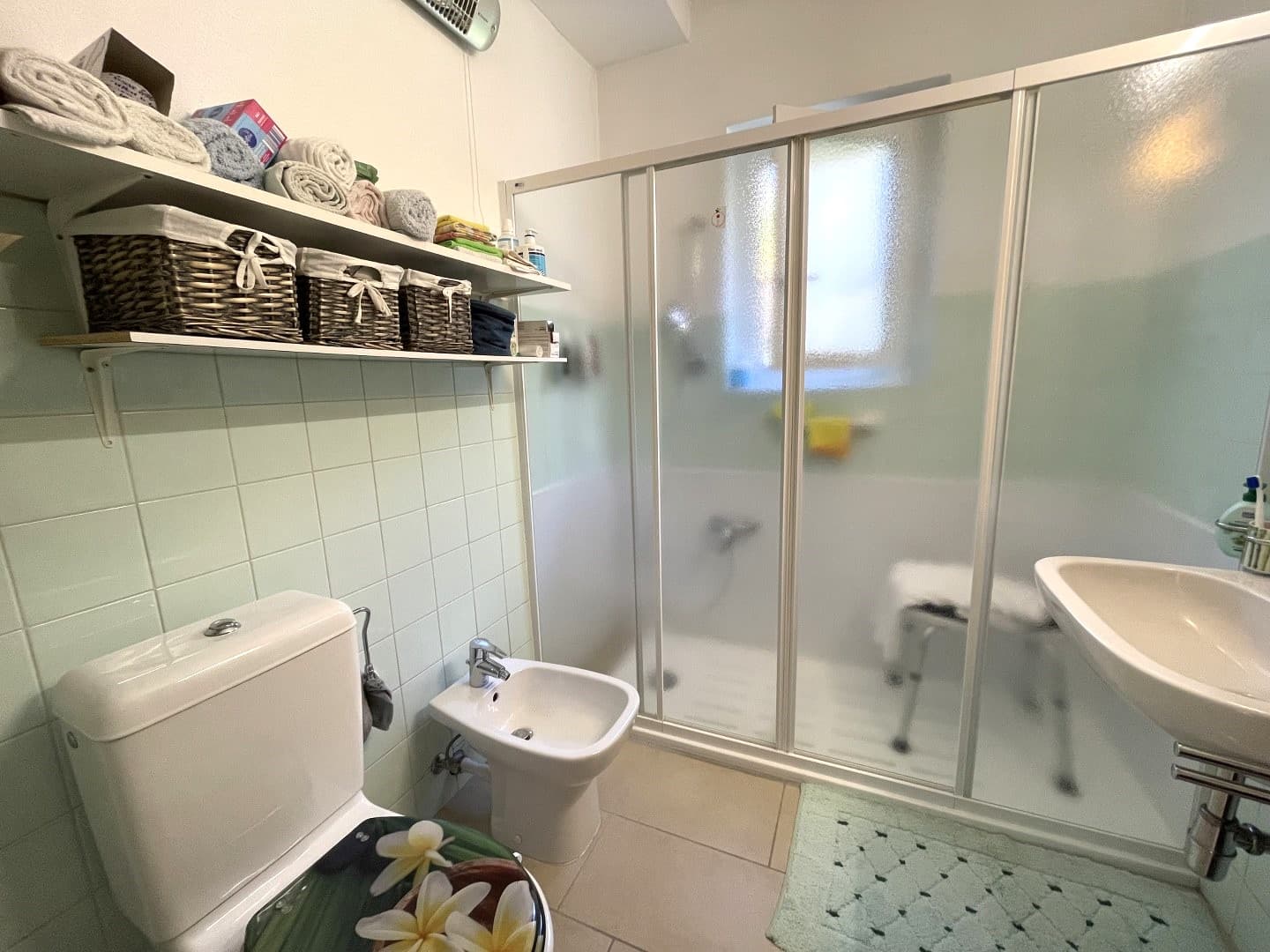 DETACHED HOUSE SURROUNDED BY GREENLAND WITH A GARDEN AND OPEN VIEWS OF THE MOUNTAINS