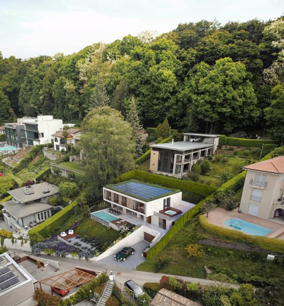 Occasione unica nella Collina d’Oro – Terreno di 776 mq con progetto approvato e vista lago