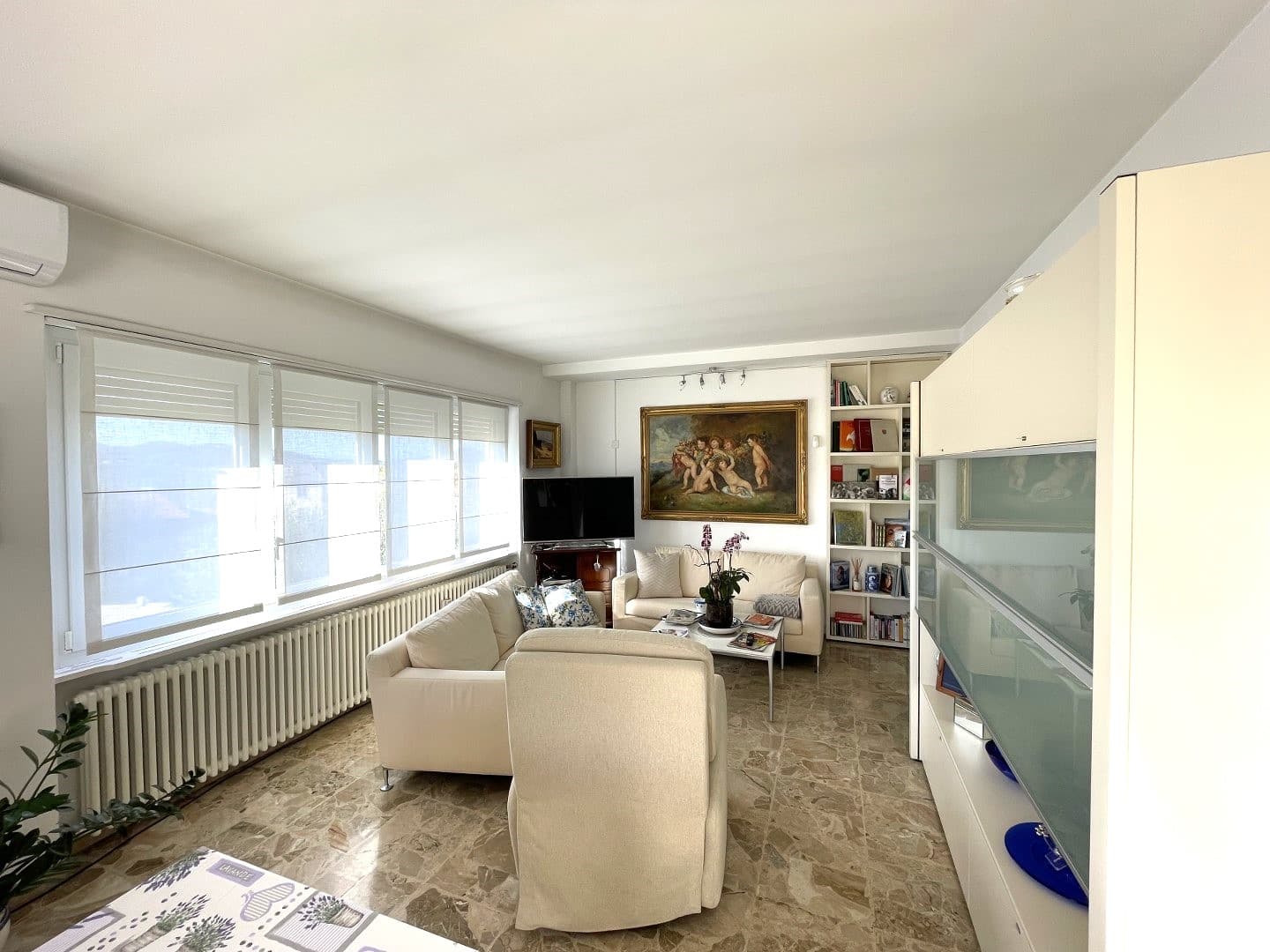 DETACHED HOUSE SURROUNDED BY GREENLAND WITH A GARDEN AND OPEN VIEWS OF THE MOUNTAINS