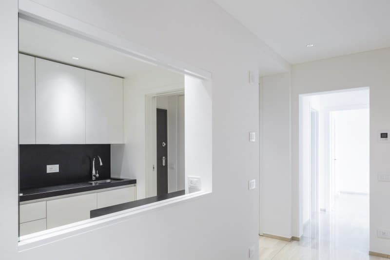 APPARTAMENTO 3.5 LOCALI CON GRANDE TERRAZZA E VISTA APERTA SULLE MONTAGNE