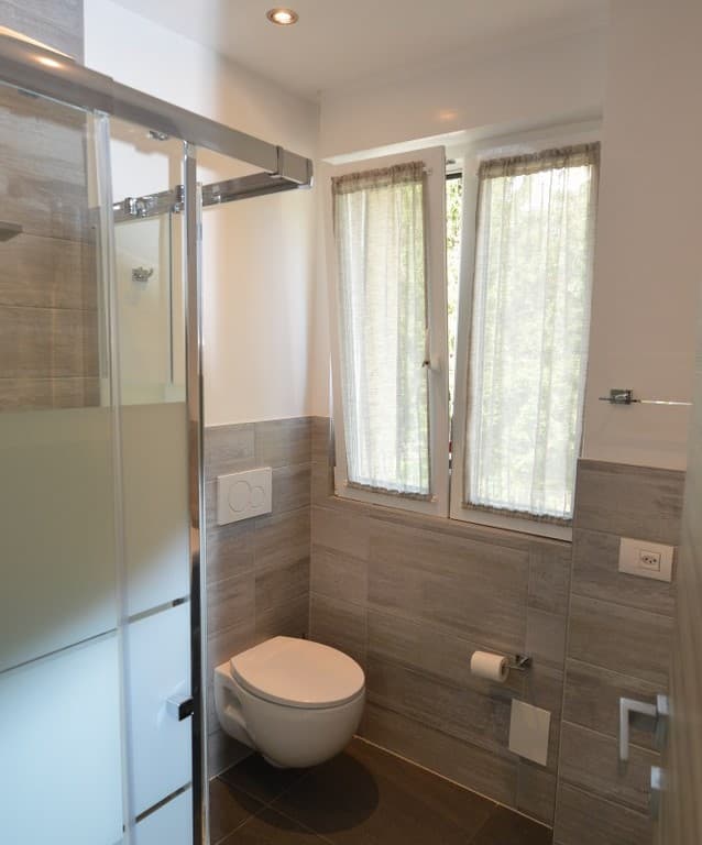 3.5-ROOM DUPLEX APARTMENT WITH GARDEN, IN A SEMI-DETACHED HOUSE