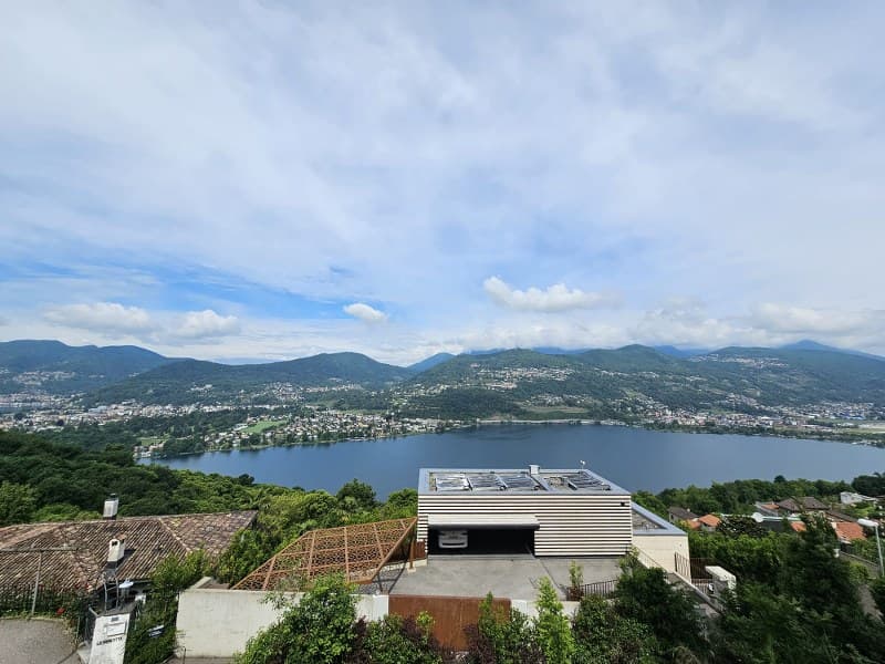 Occasione unica nella Collina d’Oro – Terreno di 776 mq con progetto approvato e vista lago