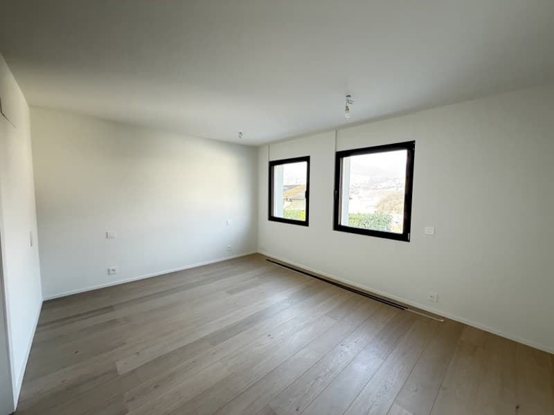 APPARTAMENTO 4.5 LOCALI CON GIARDINO AD USO ESCLUSIVO IN ELEGANTE PALAZZINA