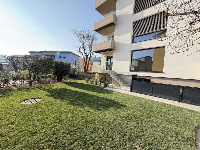 APPARTAMENTO 4.5 LOCALI CON GIARDINO AD USO ESCLUSIVO IN ELEGANTE PALAZZINA