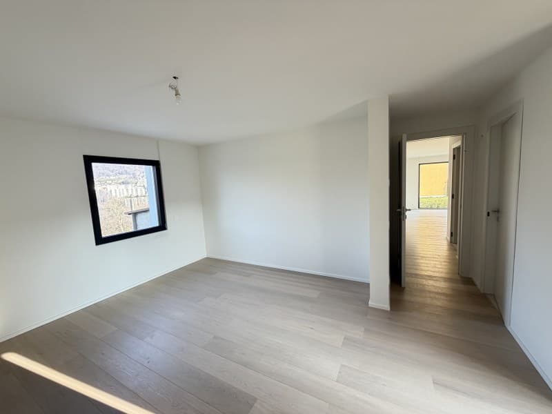 APPARTAMENTO 4.5 LOCALI CON GIARDINO AD USO ESCLUSIVO IN ELEGANTE PALAZZINA